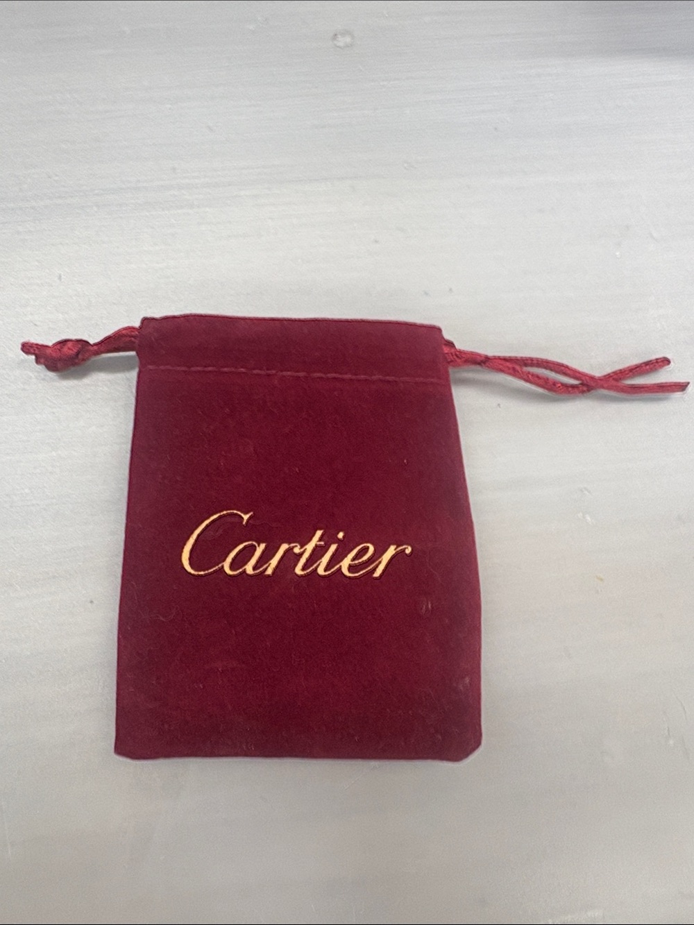 Cartier Burgundy Velvet Drawstring Pouch with Gold Logo